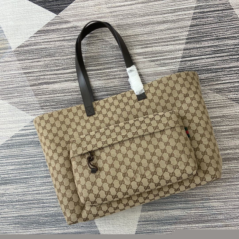 G*u*i shopping bags
